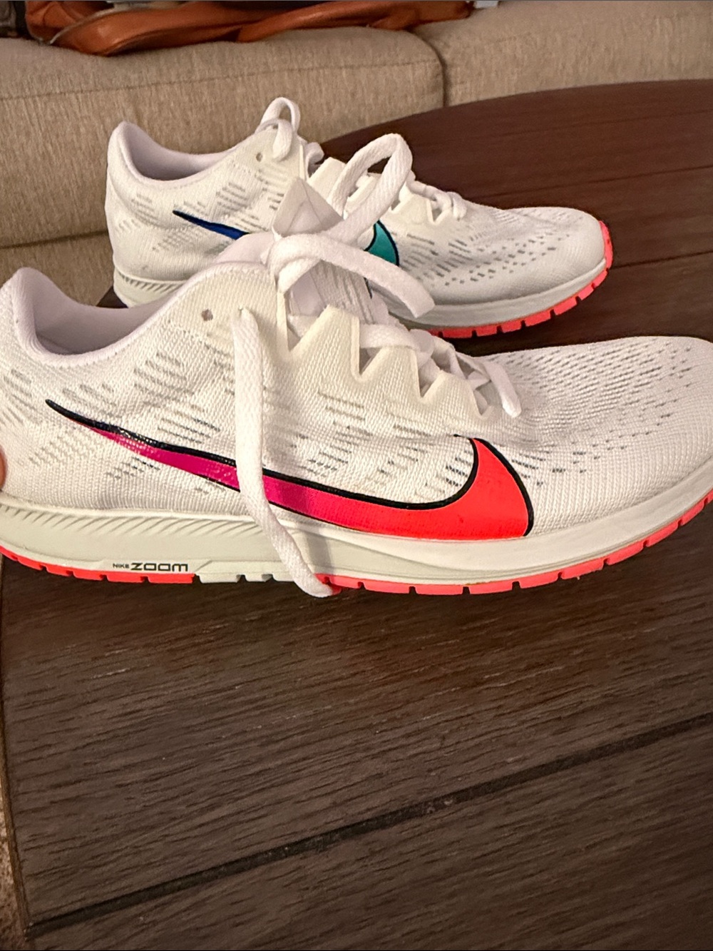 Nike Women's White Running Shoes with Neon Pink Swoosh and Coral Outsole